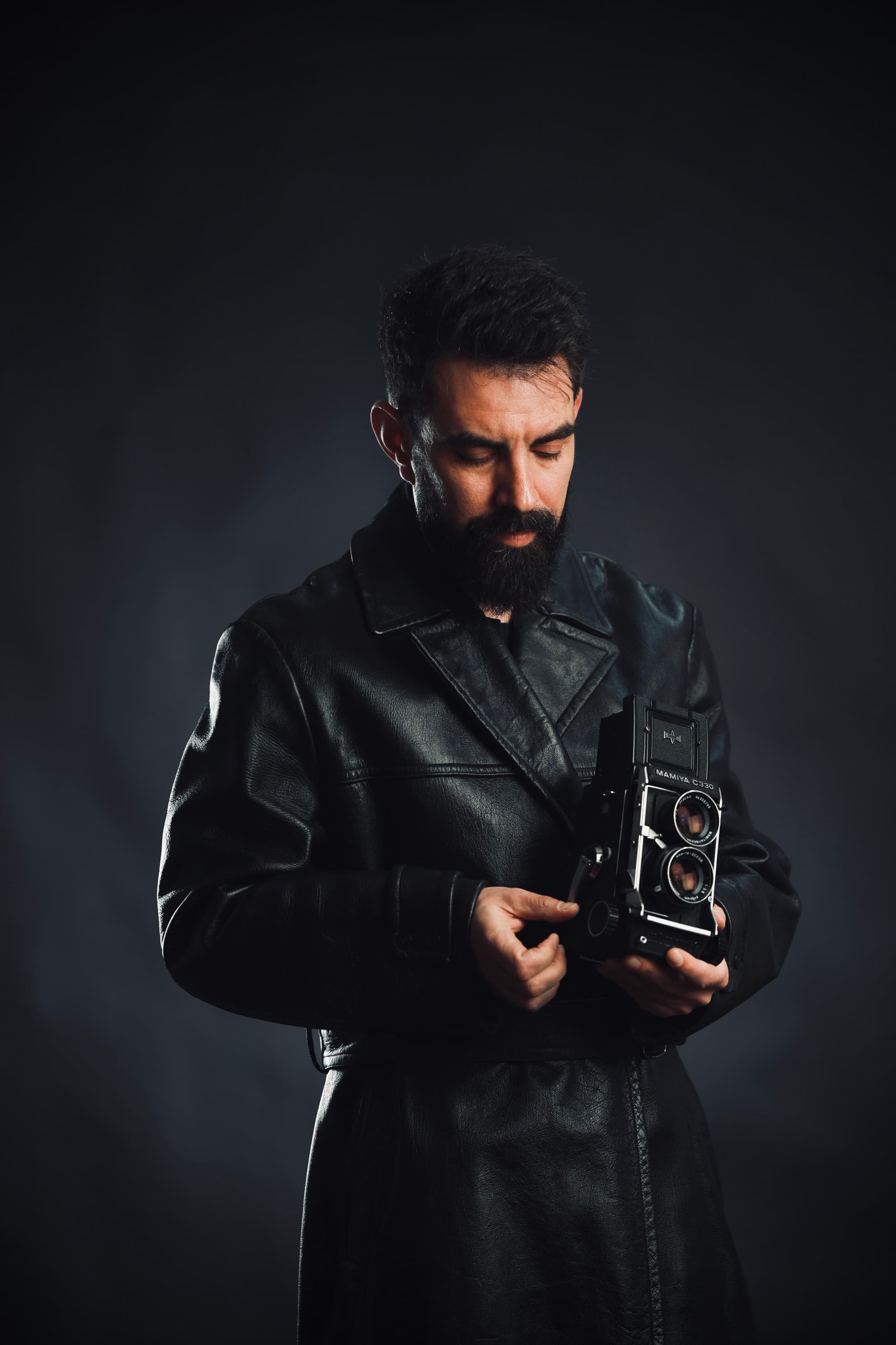 Portrait of Radu Nedelcu Holding a Camera